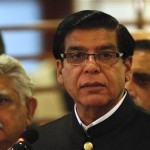 Pakistan's PM Ashraf speaks to the media at a military hospital, where he visited Yousufzai, in Rawalpindi