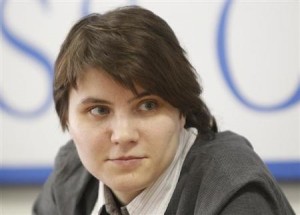 Samutsevich, freed member of the Russian punk band Pussy Riot, takes part in a news conference in Moscow