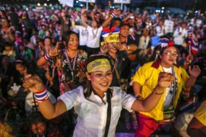 Anti-government protesters dance during a rally at Government complex in Bangkok