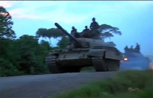 Congolese and troops gather at border