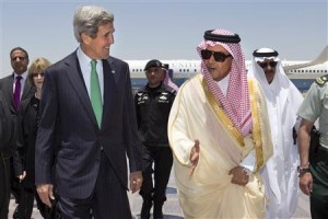 U.S. Secretary of State Kerry is greeted by Saudi Arabia's Foreign Minister Prince al-Faisal upon arrival in Jeddah