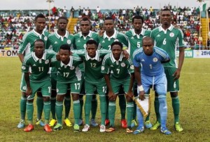Nigeria's players line up for a team photo before their 2014 World Cup qualifying soccer match against Malawi in Calabar