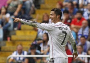 Real Madrid's Ronaldo celebrates his goal against Deportivo Coruna during their Spanish First Division soccer match at the Riazor stadium in Coruna