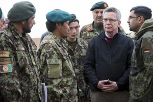 German Defence Minister de Maiziere speaks with Afghan military during his visit to Camp Shaheen outside Mazar-e-Sharif