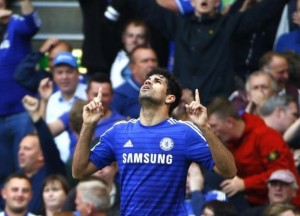 Chelsea's Costa celebrates scoring a goal against Arsenal during their English Premier League soccer match at Stamford Bridge in London