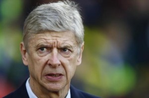 Arsenal manager Arsene Wenger walks onto the pitch before their English Premier League soccer match against Southampton at St Mary's Stadium in Southampton