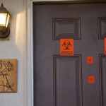 A view of the front door, which now has biohazard stickers, of the apartment where three young Muslims were killed on Tuesday, in Chapel Hill, North Carolina