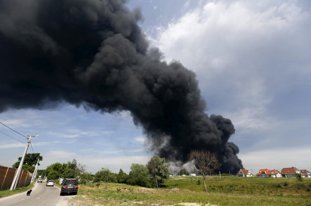 Smoke rises from a fuel depot where a fire broke out, near Vasylkiv in Kiev region, Ukraine