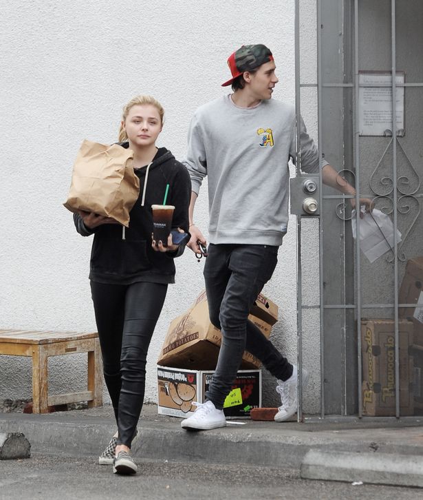 Chloe-Grace-Moretz-has-her-hands-full-while-getting-take-out-Bel-Air-Deli-in-Los-Angeles-with-boyfriend-Brooklyn-Beckham